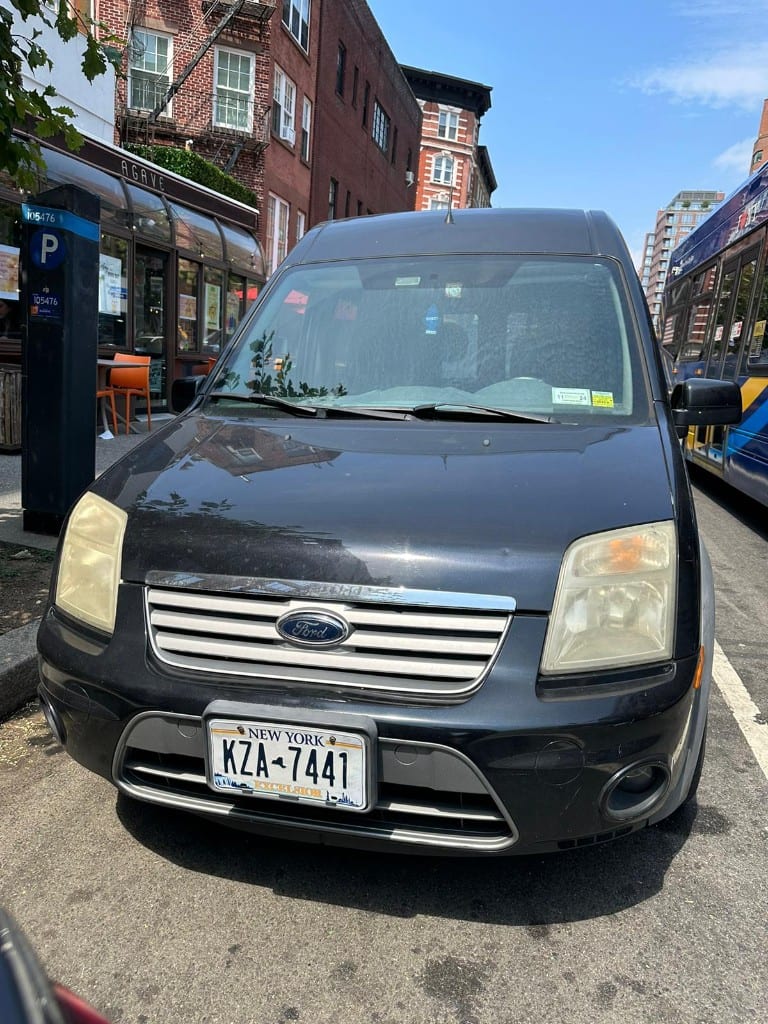 Sunny Locksmith service van — front view