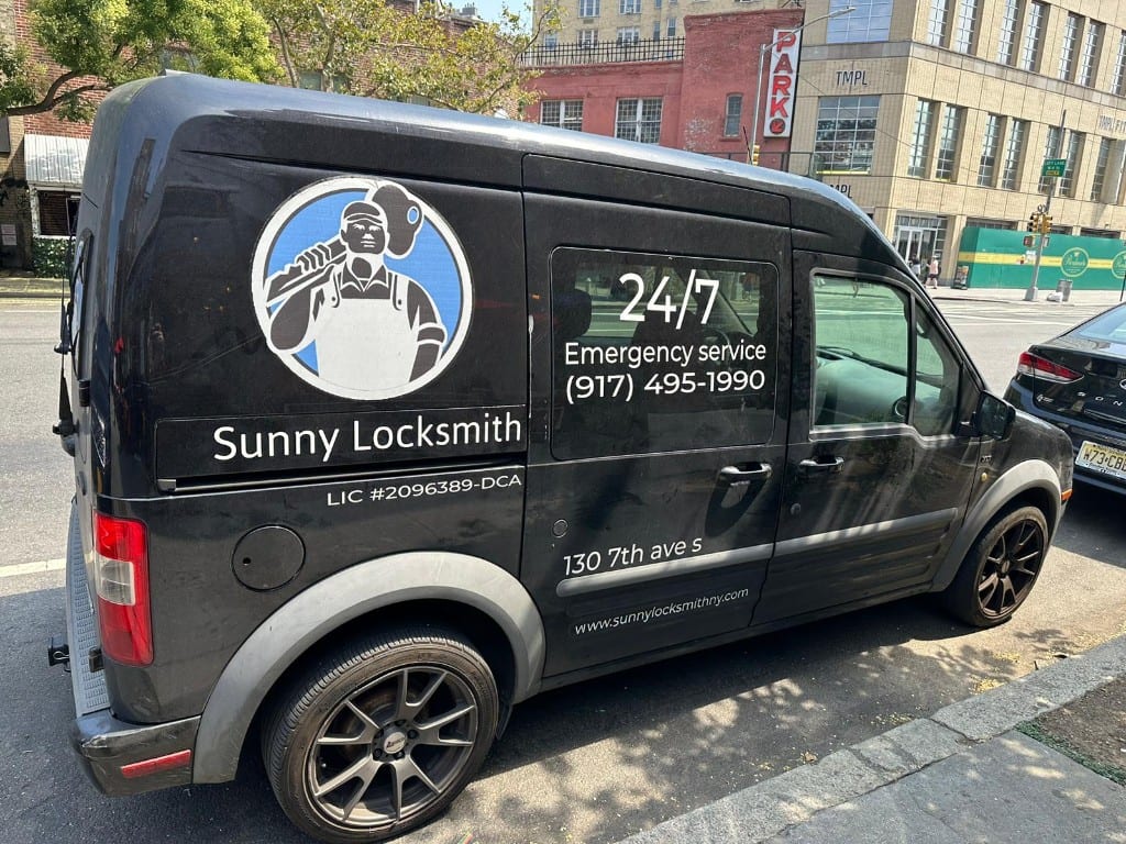 Sunny Locksmith service van — right side